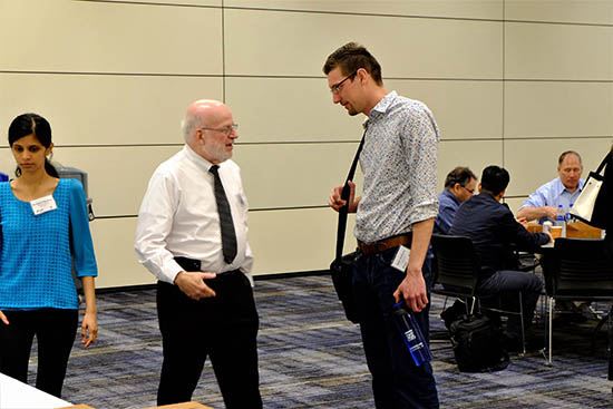 Dr. David Kaufman talks with Matt Jackson, post-doc in the Soper group, at the lunch break