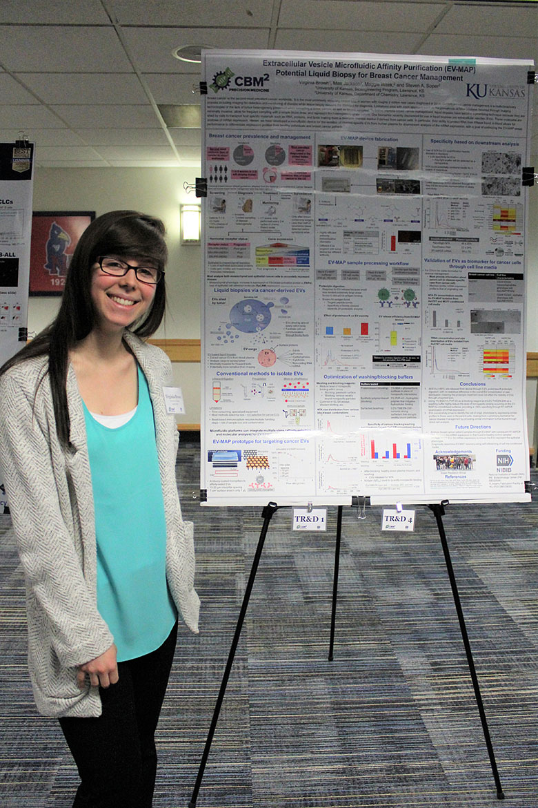 Graduate student Virginia Brown with her poster on EV-MAP
