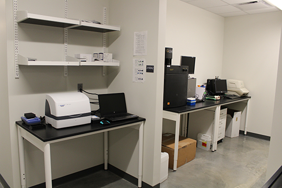 A couple tables with equipment inside of the Sequencing room