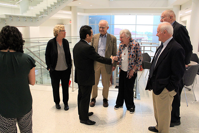 (from left) Dr. Steve Soper, Dr. Ted Kuwana, Dr. Sue Lunte, Dr. Teruhisa Ueda, Dr. George Wilson (back), Dr. Marlin Harmony, Nancy Harmony, and Dr. Rich Givens