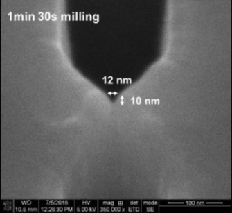 Black and white electron microscopy image labeled '1min 30s milling' showing a textured surface with notations indicating features of 12 nm and 10 nm in size. Image metrics are displayed at the bottom